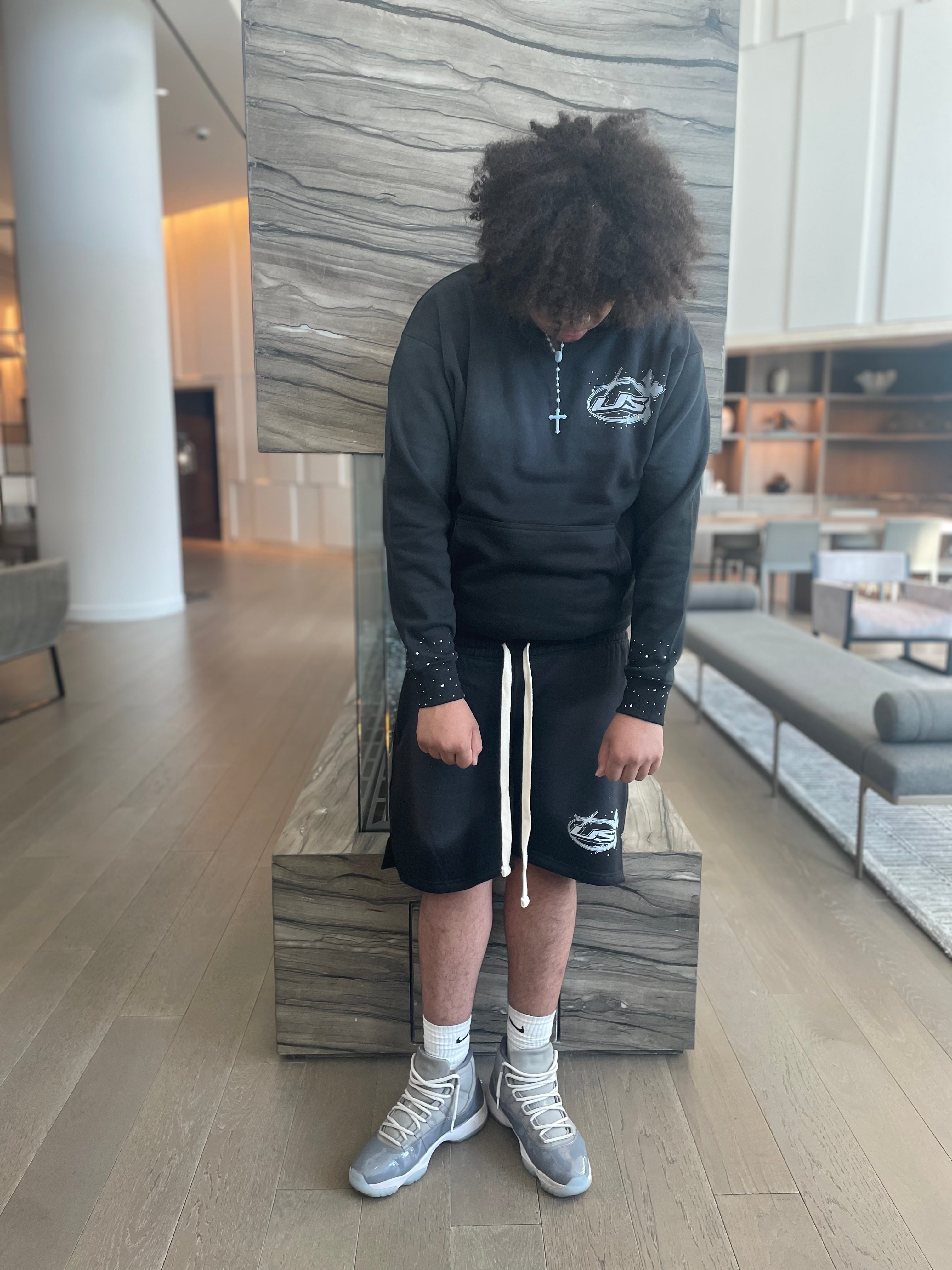 BLACK "THE STORY" PULL OVER HOODIE AND SHORT SET.